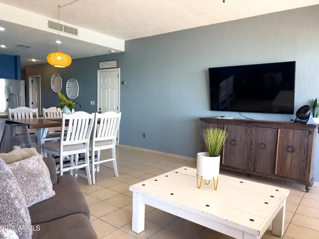 a bedroom with bed and a window