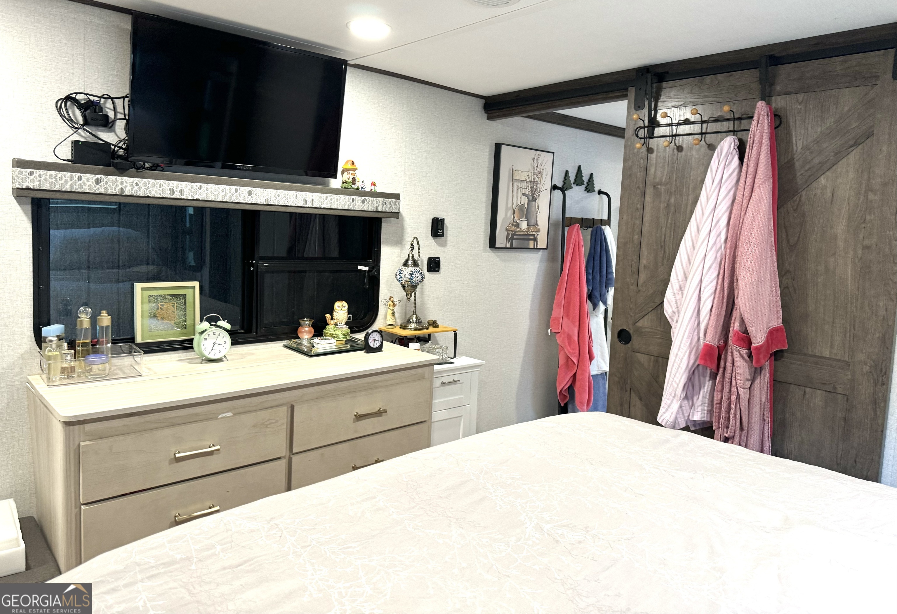 279 Leisure Acres Drive Cleveland, GA 30528 - Photo 15 of 40 a bed room with a bed and a mirror