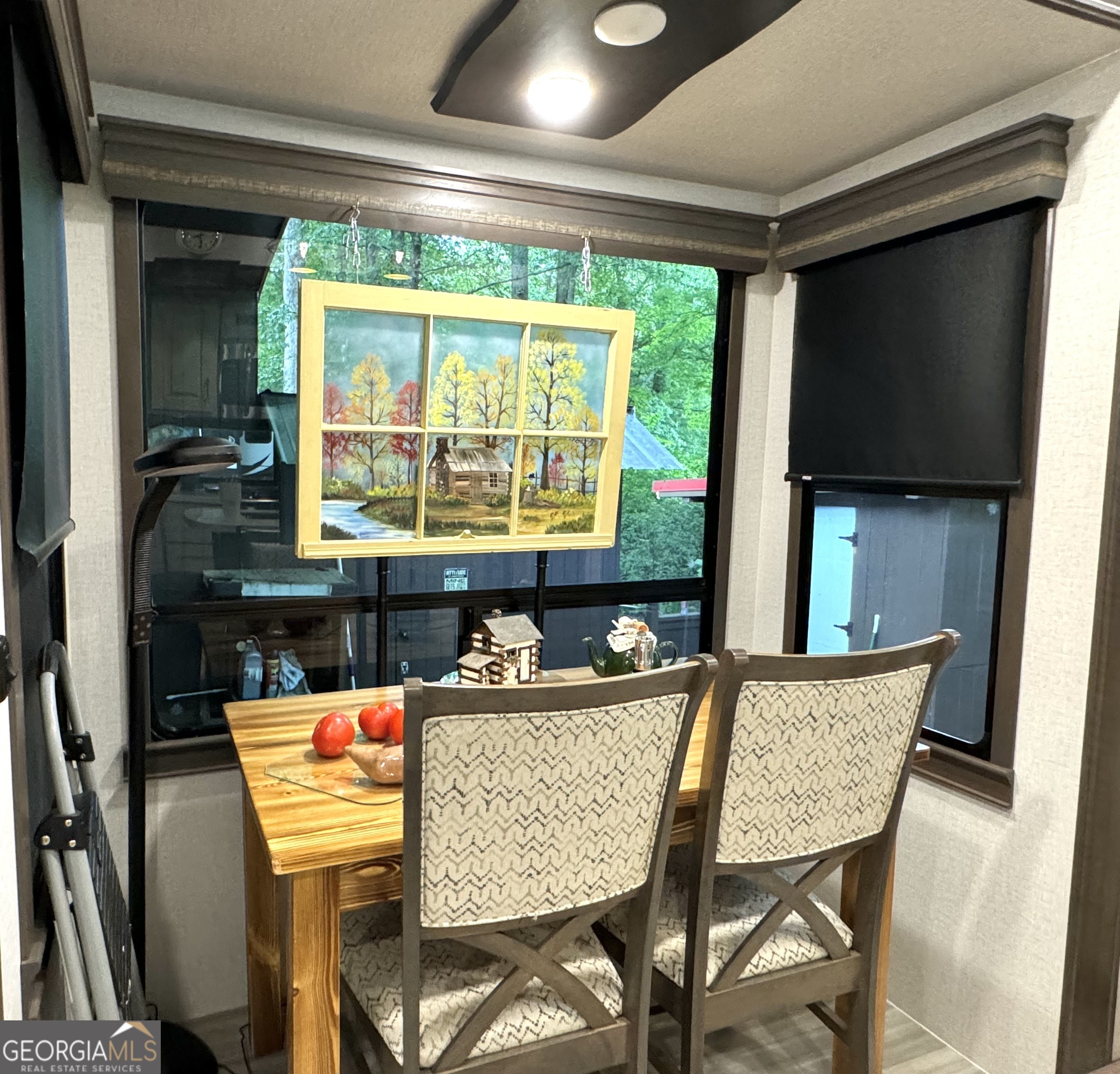 279 Leisure Acres Drive Cleveland, GA 30528 - Photo 19 of 40 a dining room with furniture and a window