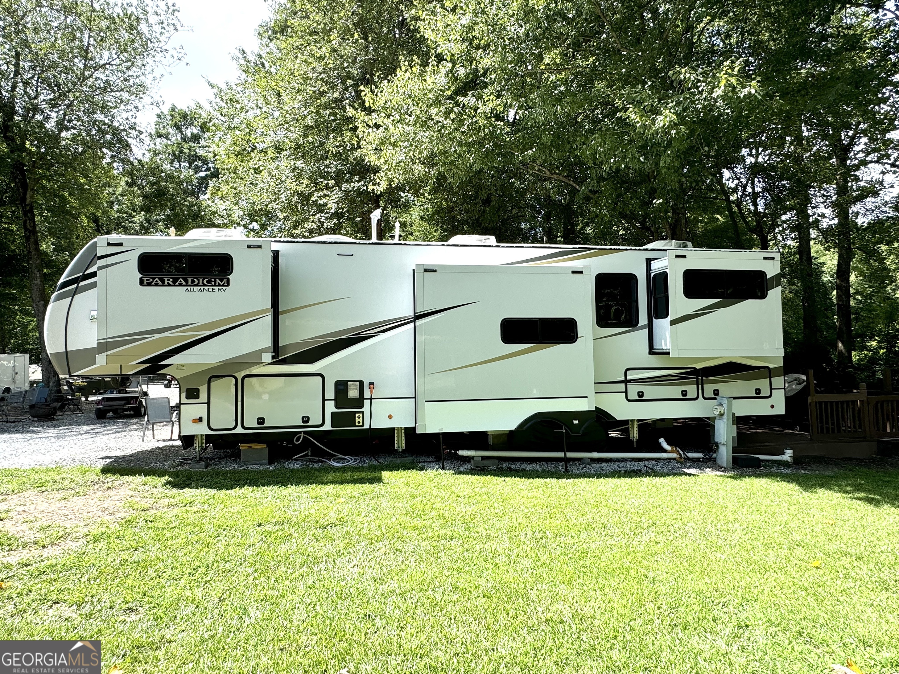 279 Leisure Acres Drive Cleveland, GA 30528 - Photo 25 of 40 a front view of a house with a yard