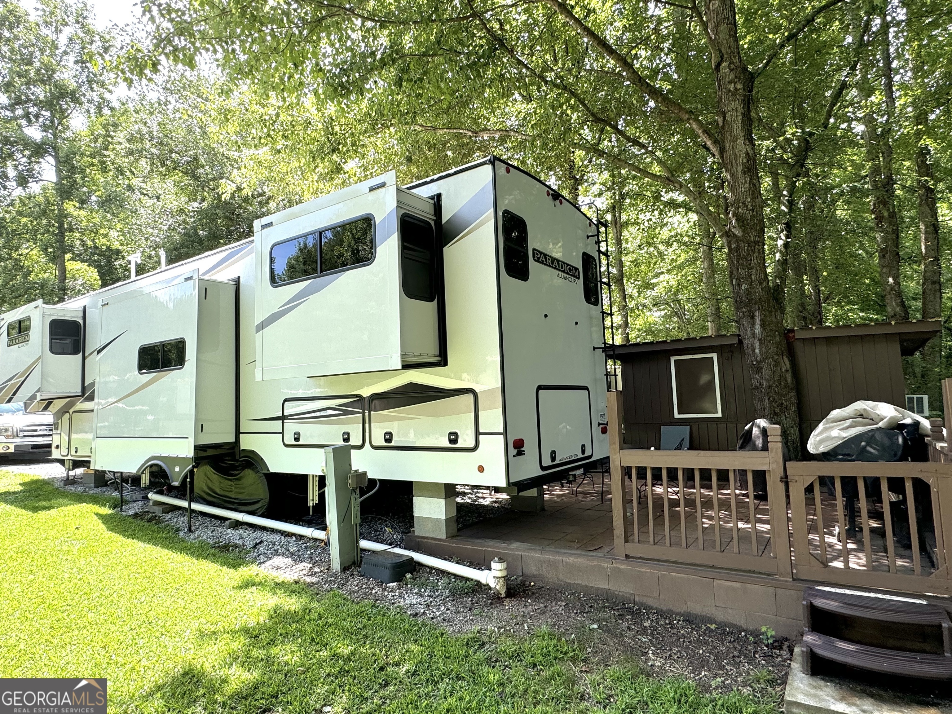 279 Leisure Acres Drive Cleveland, GA 30528 - Photo 26 of 40 a view of a back yard with a patio