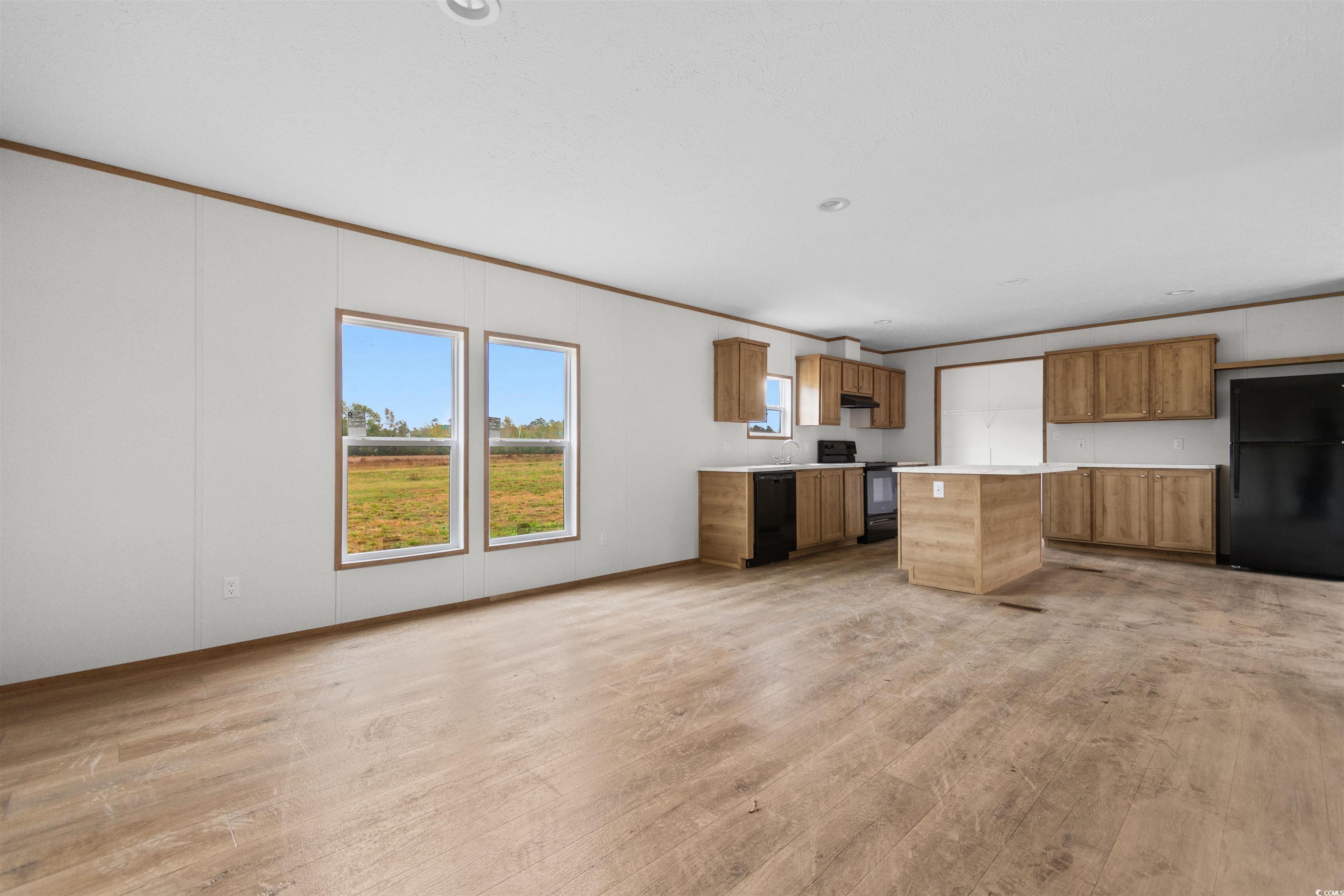 5988 Pleasant View Church Road Nichols, SC 29581 - Photo 5 of 40 Kitchen featuring light wood-type flooring, a kitc