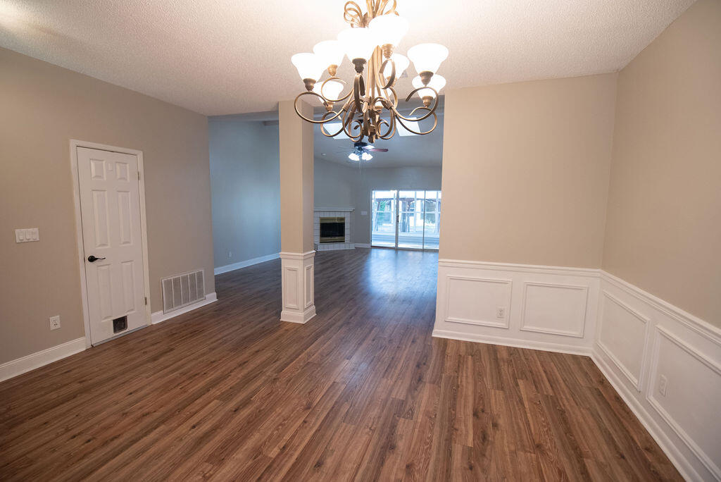 4565 Parkwood Court Niceville, FL 32578 - Photo 15 of 48 a view of a livingroom with wooden floor