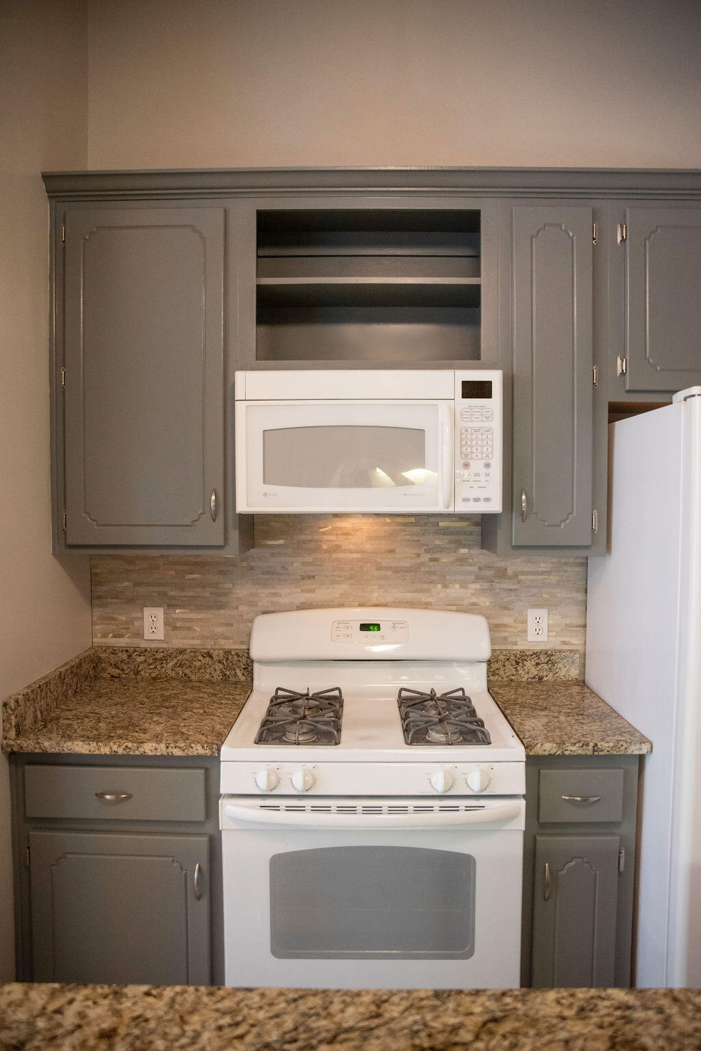 4565 Parkwood Court Niceville, FL 32578 - Photo 22 of 48 a white stove top oven sitting inside of a kitchen