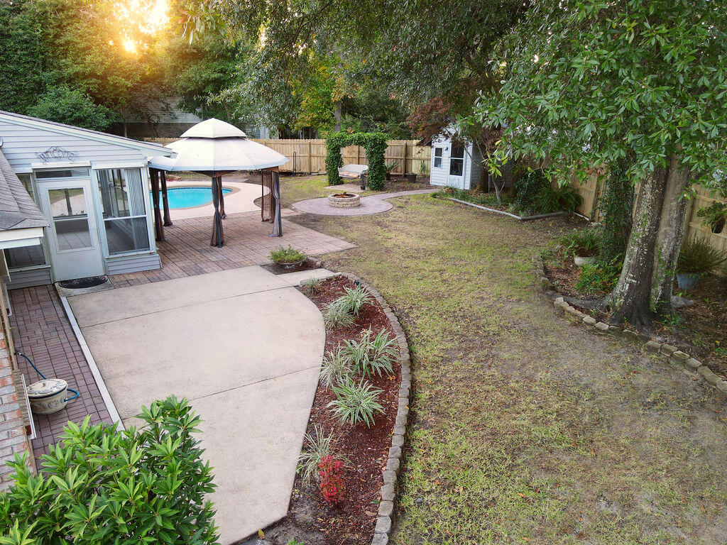 4565 Parkwood Court Niceville, FL 32578 - Photo 45 of 48 a view of a backyard with a patio and plants