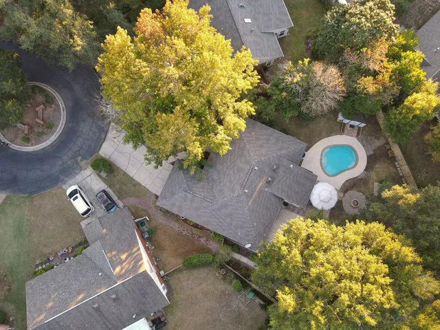 a bathroom with a sink mirror and vanity