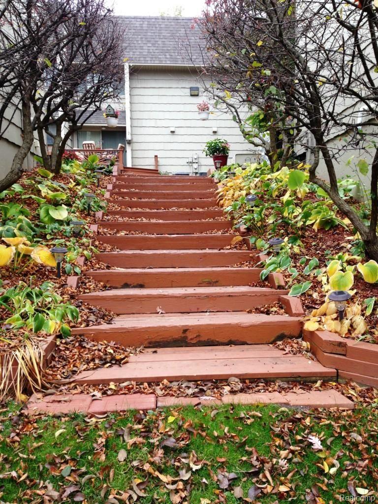 616 Rickett Road, Unit 109 Brighton, MI 48116 - Photo 5 of 38 Ext Stairs Fromt Lower Level to Sidewalk.jpg