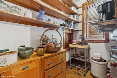 a kitchen with a stove and cabinets