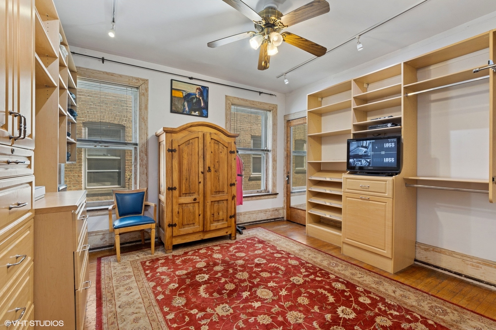5863 North Kenmore Avenue, Unit 2 Chicago, IL 60660 - Photo 17 of 26 a living room with furniture and a window
