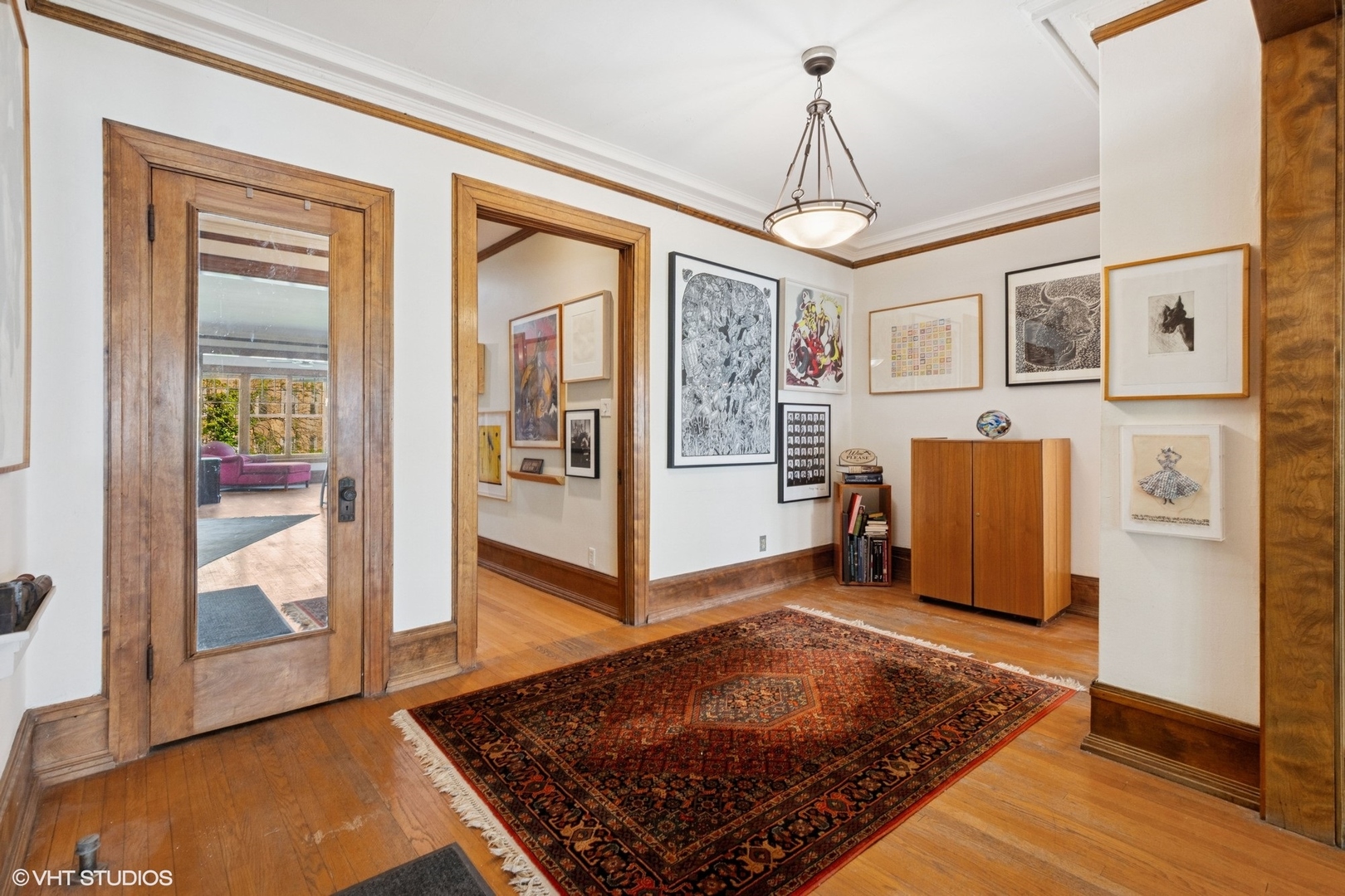 5863 North Kenmore Avenue, Unit 2 Chicago, IL 60660 - Photo 2 of 26 a view of a livingroom with furniture window and wooden floor