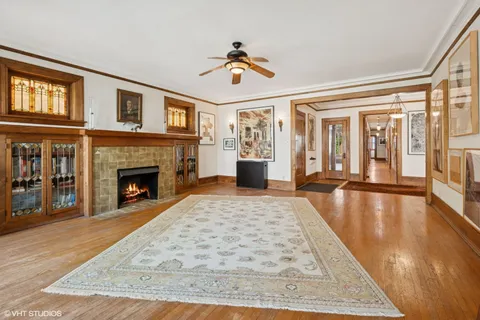 a view of an entryway with fireplace