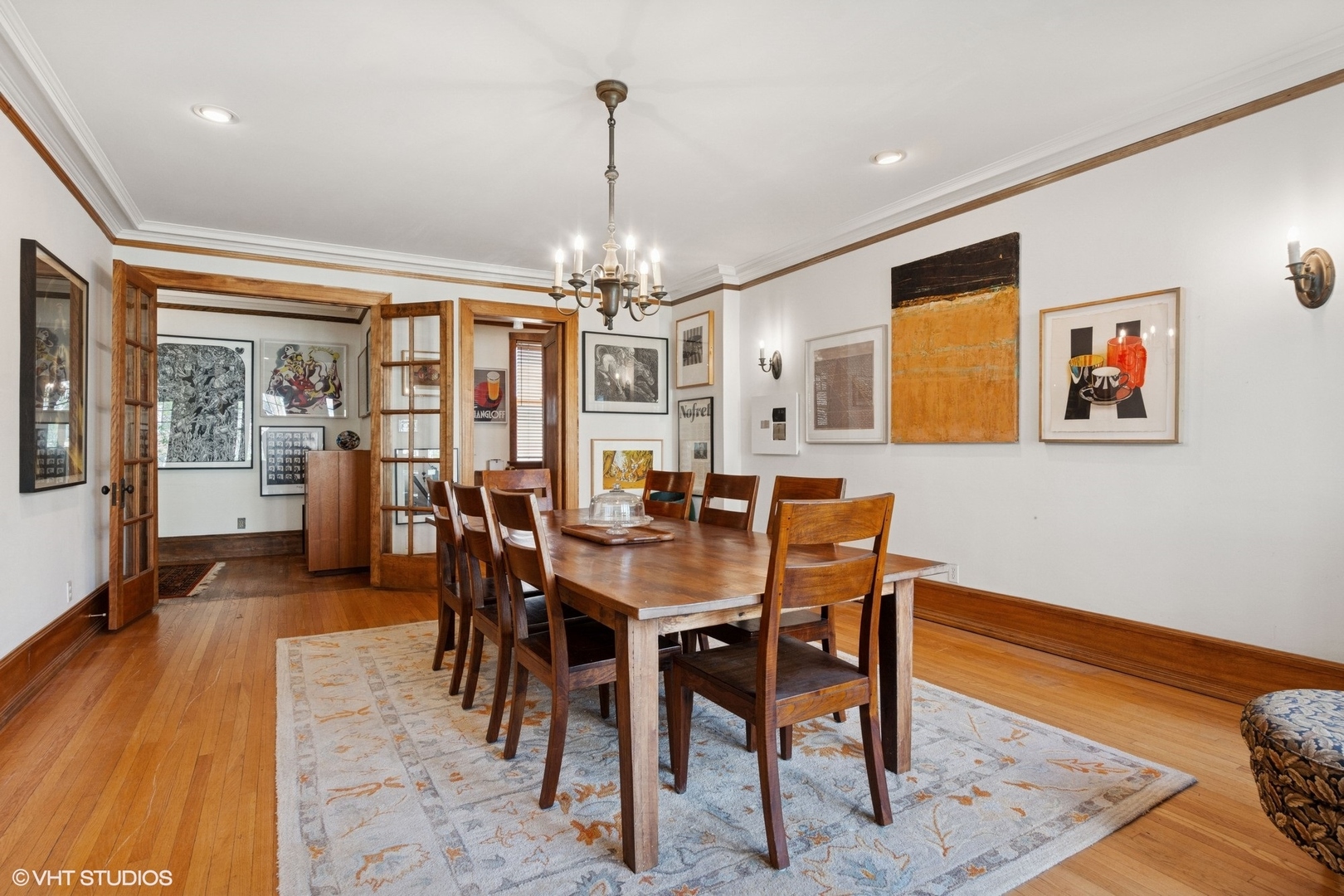 5863 North Kenmore Avenue, Unit 2 Chicago, IL 60660 - Photo 7 of 26 a view of a dining room with furniture window and wooden floor