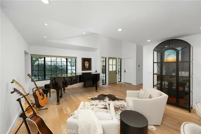 a kitchen with a dining table and chairs