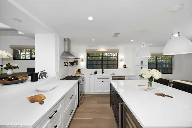 a view of a dining room with furniture and a rug
