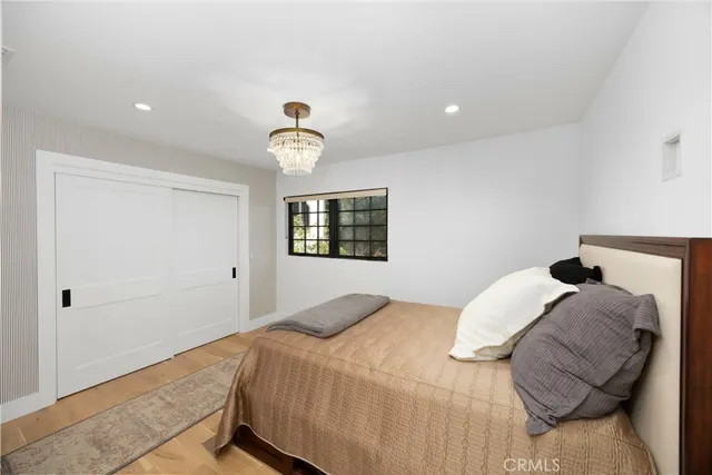 a view of a swimming pool with furniture