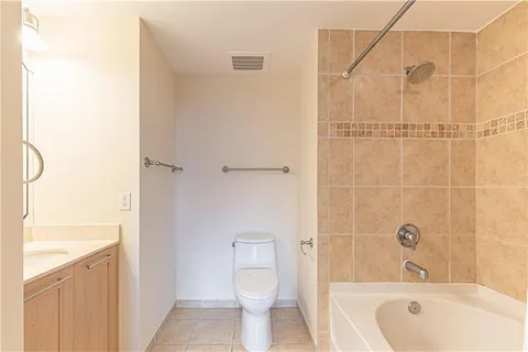a bathroom with a toilet and a sink