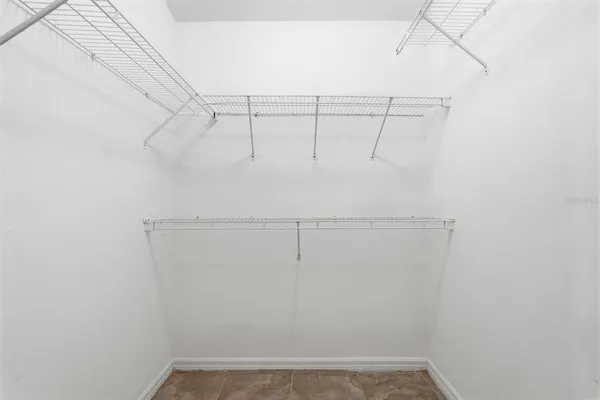 a view of a room with racks on the wall
