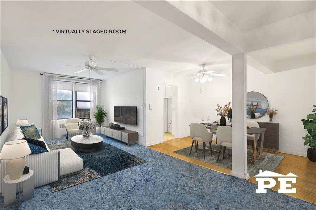 2425 Haring Street, Unit 4G Brooklyn, NY 11235 - Photo 11 of 29 a living room with furniture wooden floor and a fireplace