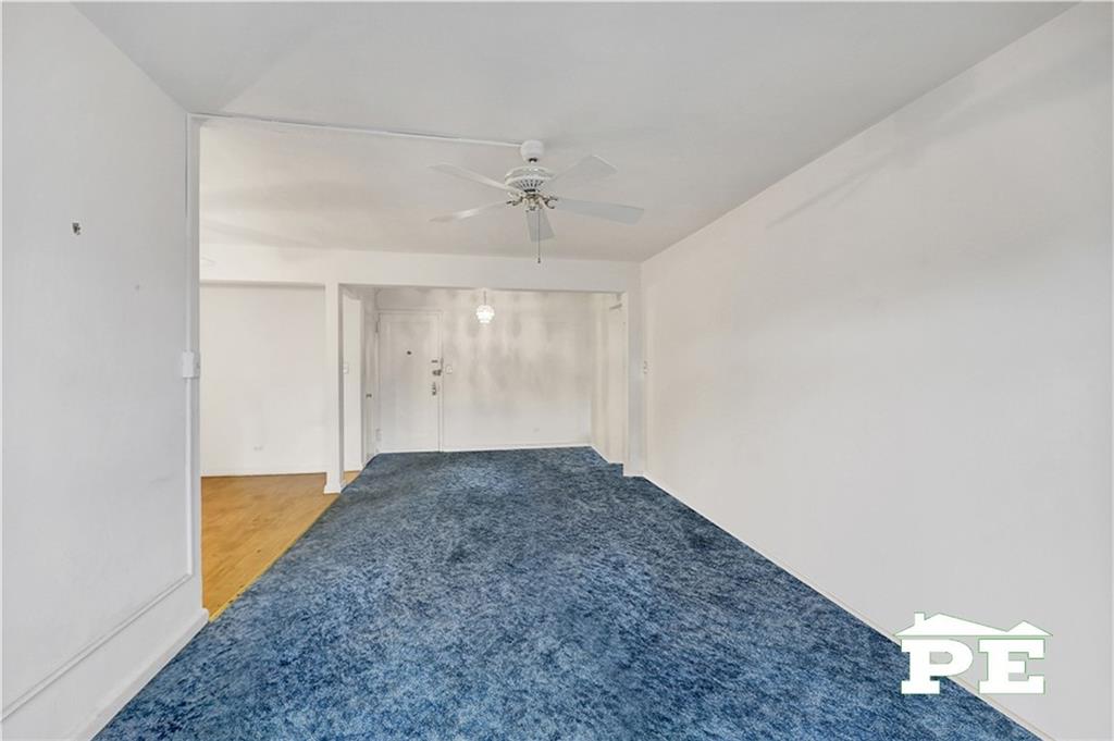 2425 Haring Street, Unit 4G Brooklyn, NY 11235 - Photo 20 of 29 wooden floor in an empty room