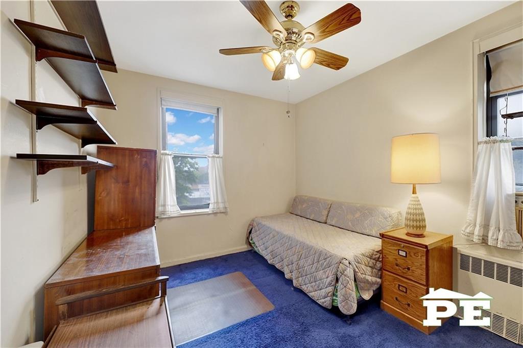 2425 Haring Street, Unit 4G Brooklyn, NY 11235 - Photo 25 of 29 a living room with furniture and a window