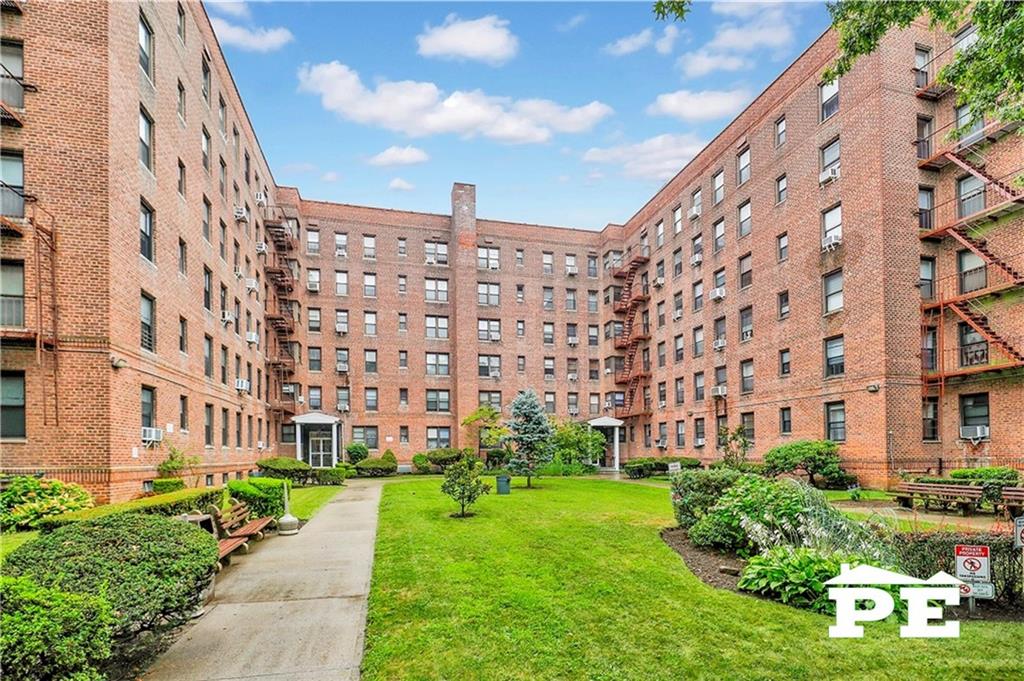 2425 Haring Street, Unit 4G Brooklyn, NY 11235 - Photo 28 of 29 a view of building with garden