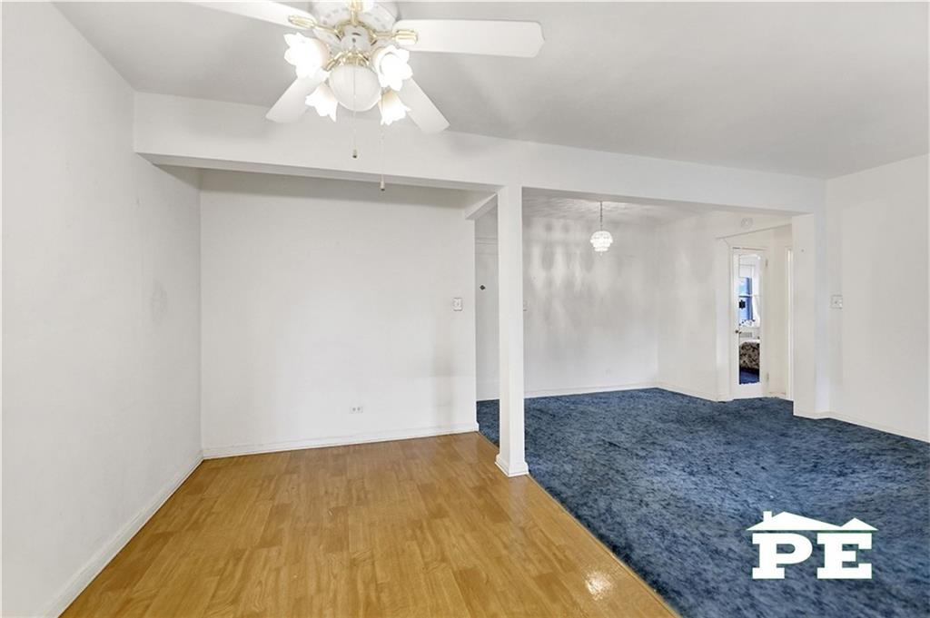 2425 Haring Street, Unit 4G Brooklyn, NY 11235 - Photo 4 of 29 a view of empty room with window and ceiling fan