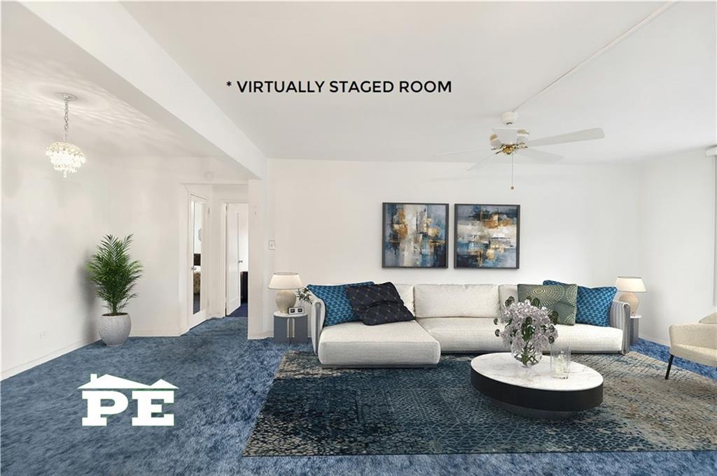 2425 Haring Street, Unit 4G Brooklyn, NY 11235 - Photo 6 of 29 a living room with furniture and a potted plant