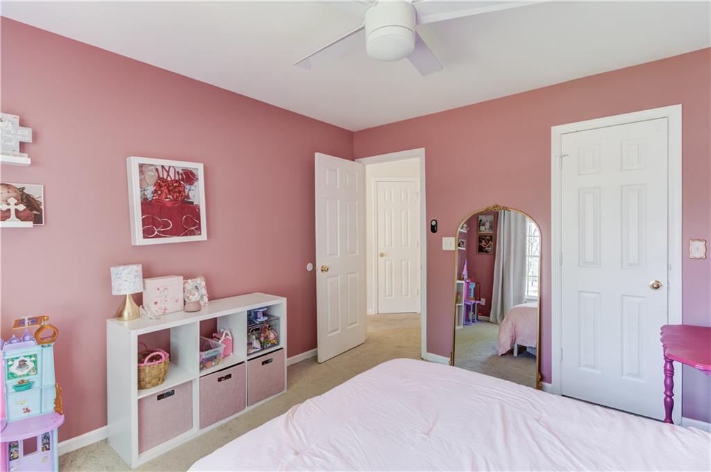 2310 Olde Hickory Place Monroe, GA 30656 - Photo 25 of 46 a bedroom with furniture and a bed