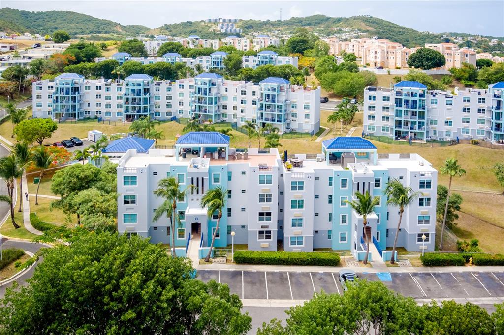 13 Edf 13, Unit 202 Ceiba, PR 00735 - Photo 1 of 1 a view of a city with tall buildings