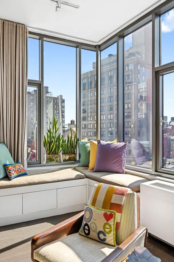 210 Lafayette Street, Unit 7A Manhattan, NY 10012 - Photo 3 of 13 a bedroom with furniture and a window