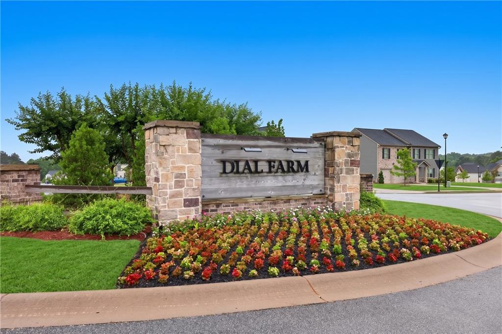 480 Overlook Road Covington, GA 30014 - Photo 20 of 20 a view of a sign board with a garden in the background