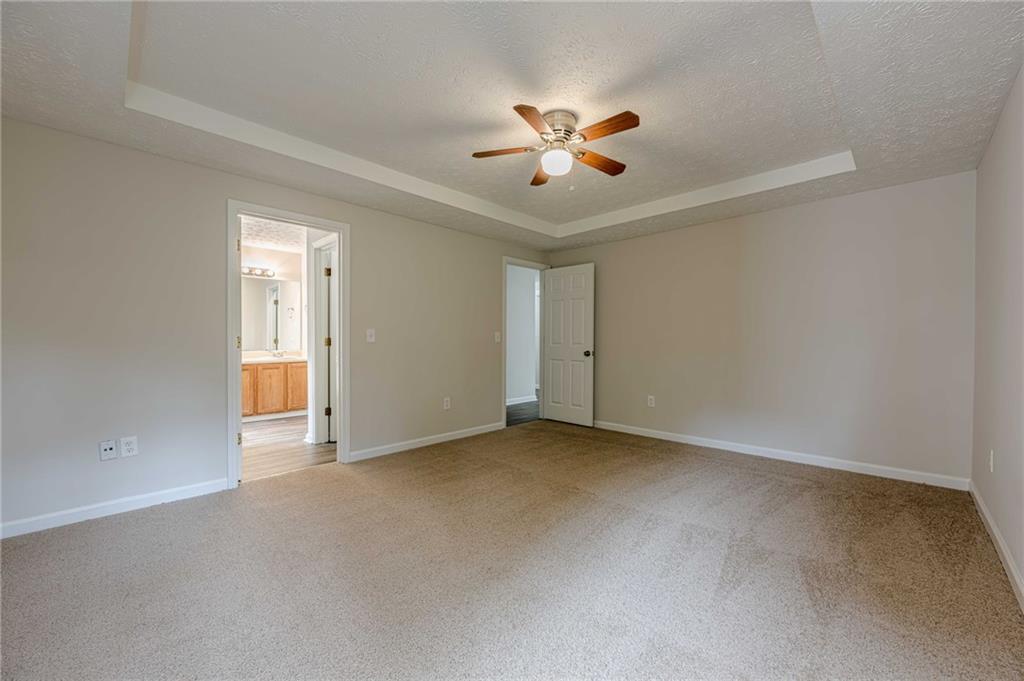 1276 To Lani Farm Road Stone Mountain, GA 30083 - Photo 10 of 16 a view of an empty room with a window