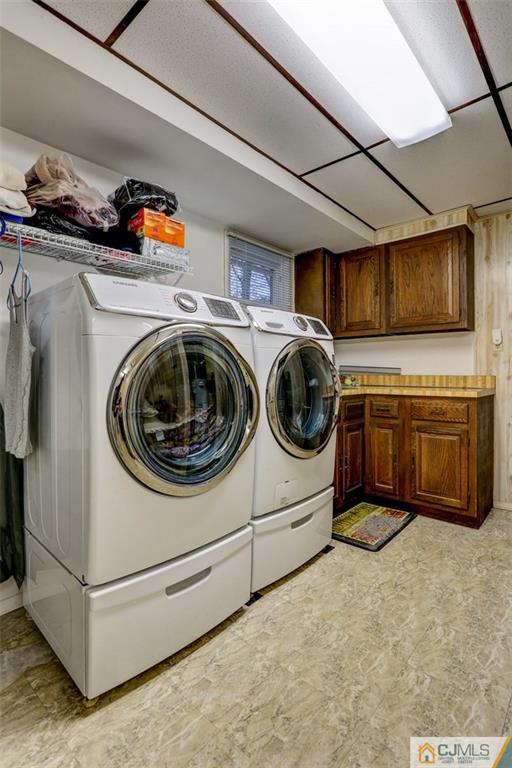 300 Aldrich Road Howell, NJ 07731 - Photo 17 of 19 a utility room with dryer and washer
