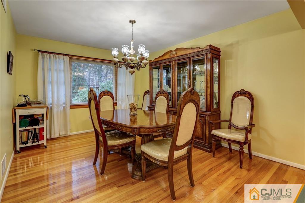 300 Aldrich Road Howell, NJ 07731 - Photo 6 of 19 a view of a dining room with furniture and chandelier