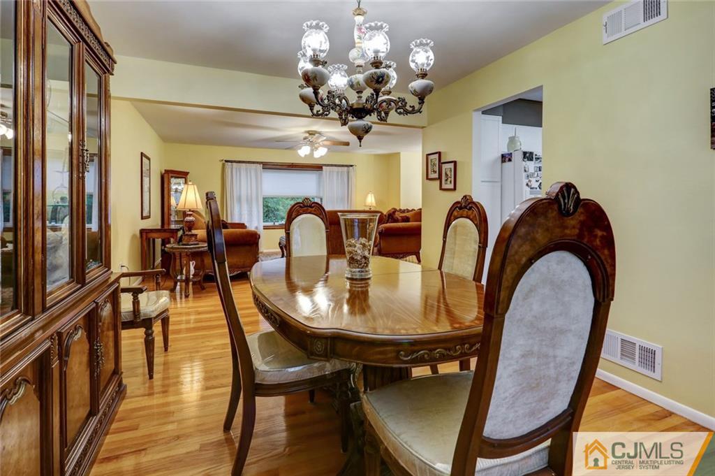 300 Aldrich Road Howell, NJ 07731 - Photo 7 of 19 a view of a dining room with furniture and chandelier