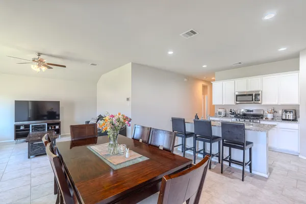 a view of a dining room with furniture