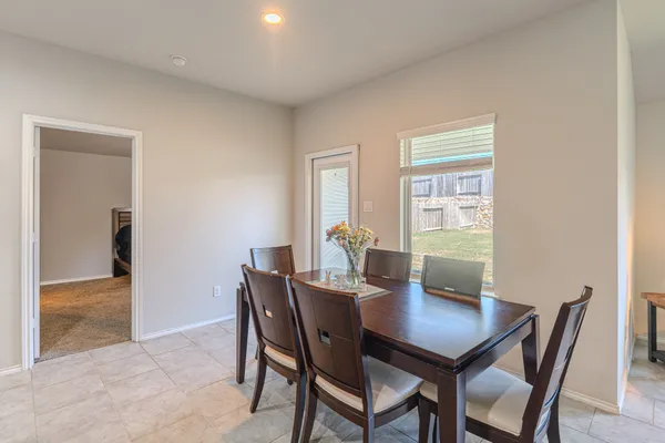 a view of a dining room with furniture