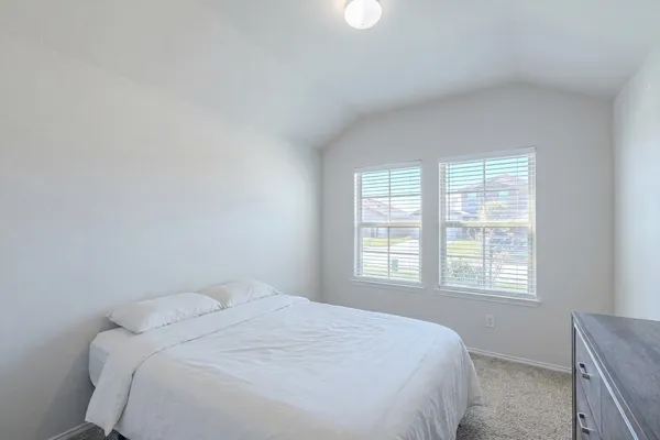 a bathroom with a tub and shower