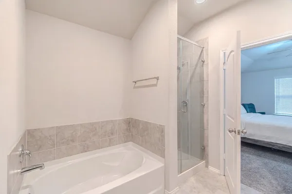 a bedroom with a bed and a closet