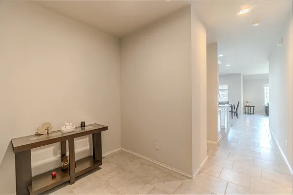 a view of a hallway with workspace