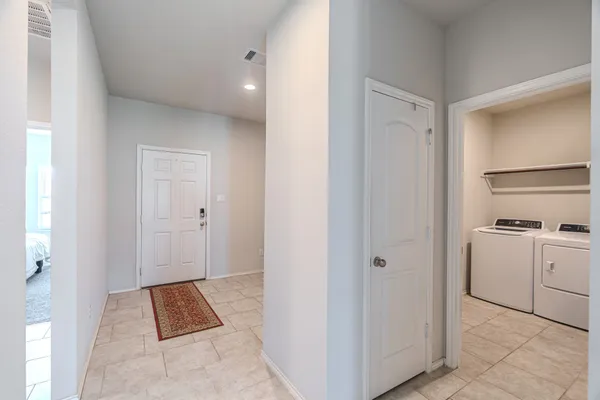 a view of room with cabinets
