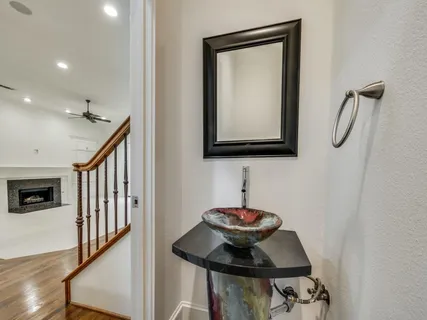 a view of a hallway with seating area