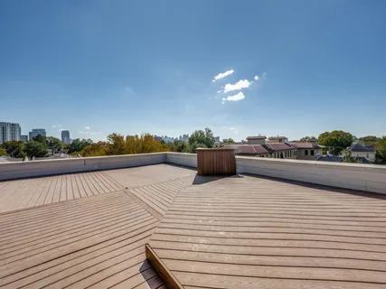 a outdoor living space with furniture and a potted plant