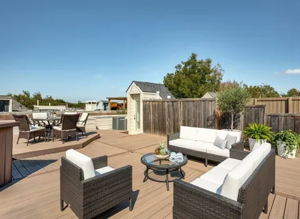 a swimming pool with wooden fence