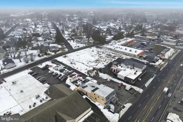 an aerial view of waterside residential building
