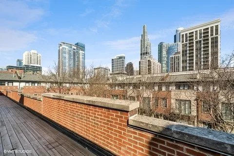 a view of a balcony with city view