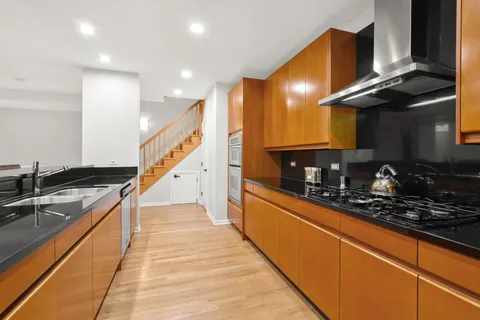 a kitchen with granite countertop lots of counter top space