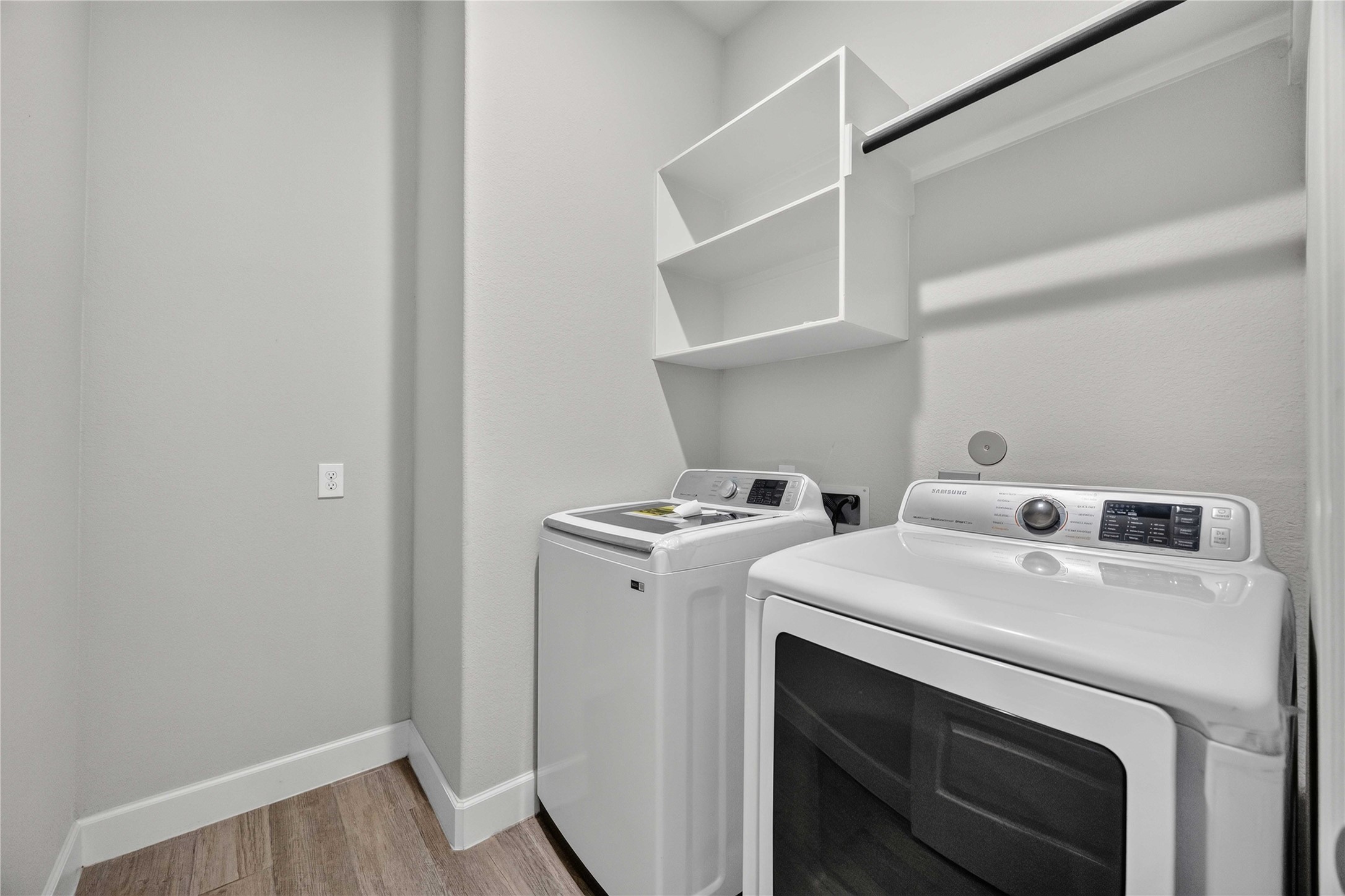 4333 Arbor Crest Lane Manvel, TX 77578 - Photo 24 of 40 Brightly lit and highly functional, this dedicated utility space offers ample space with convenient built-in overhead storage shelves.