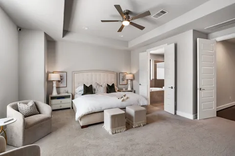 a bedroom with bed and window