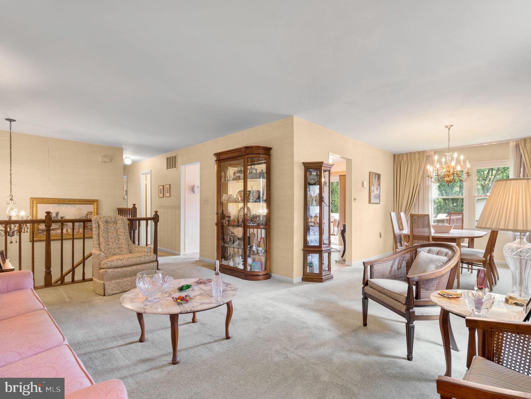 1709 Glastonberry Road Rockville, MD 20854 - Photo 11 of 27 a living room with furniture and wooden floor